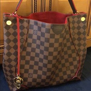 LOUIS Vuitton Caissa hobo in cherry